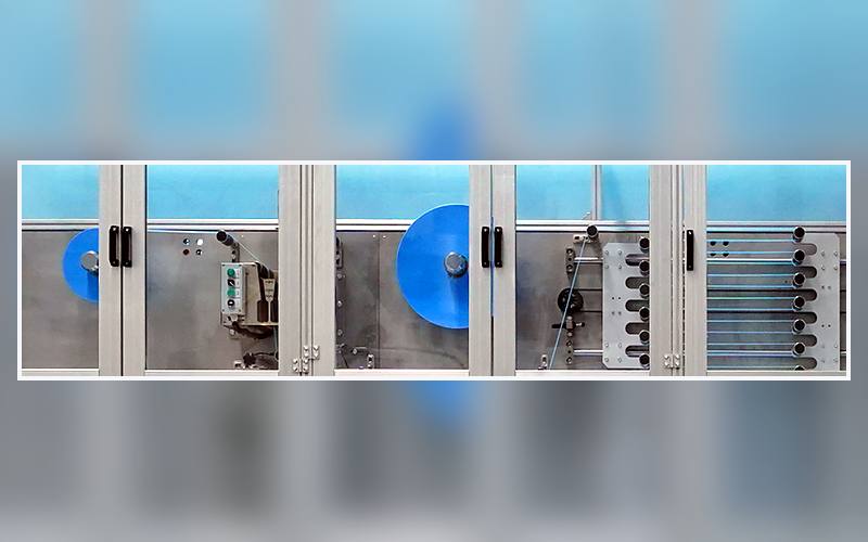 Station 05 Blue Core Layer Unwind on a sanitary napkin production line